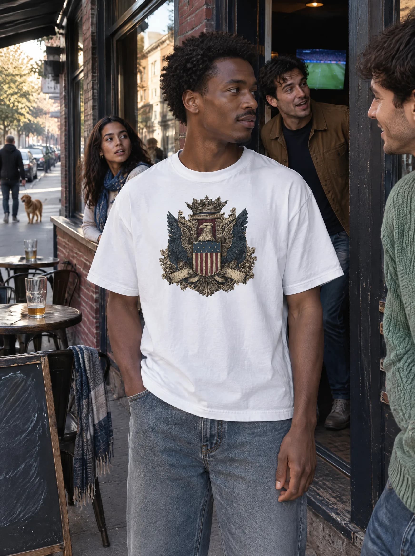 Fictional friends outside a neighbourhood pub on a match day, the wearer in the white HOUSE OF AMERICA crest tee